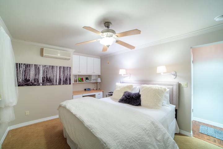 Master Bedroom.  King sized bed with exquisite linens.  