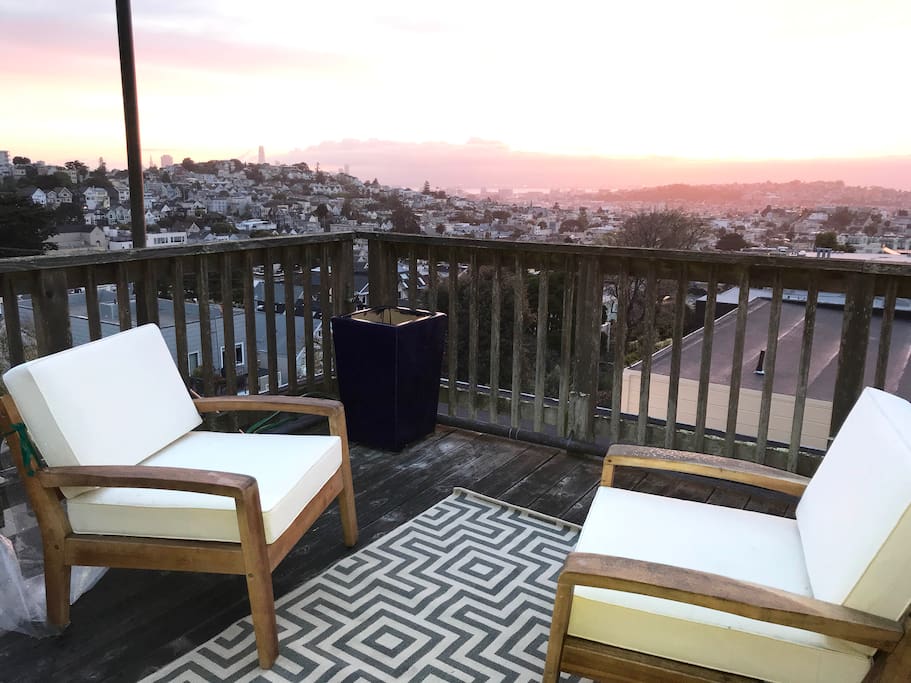 Step onto the large private deck from bed for a sunrise over the Bay.