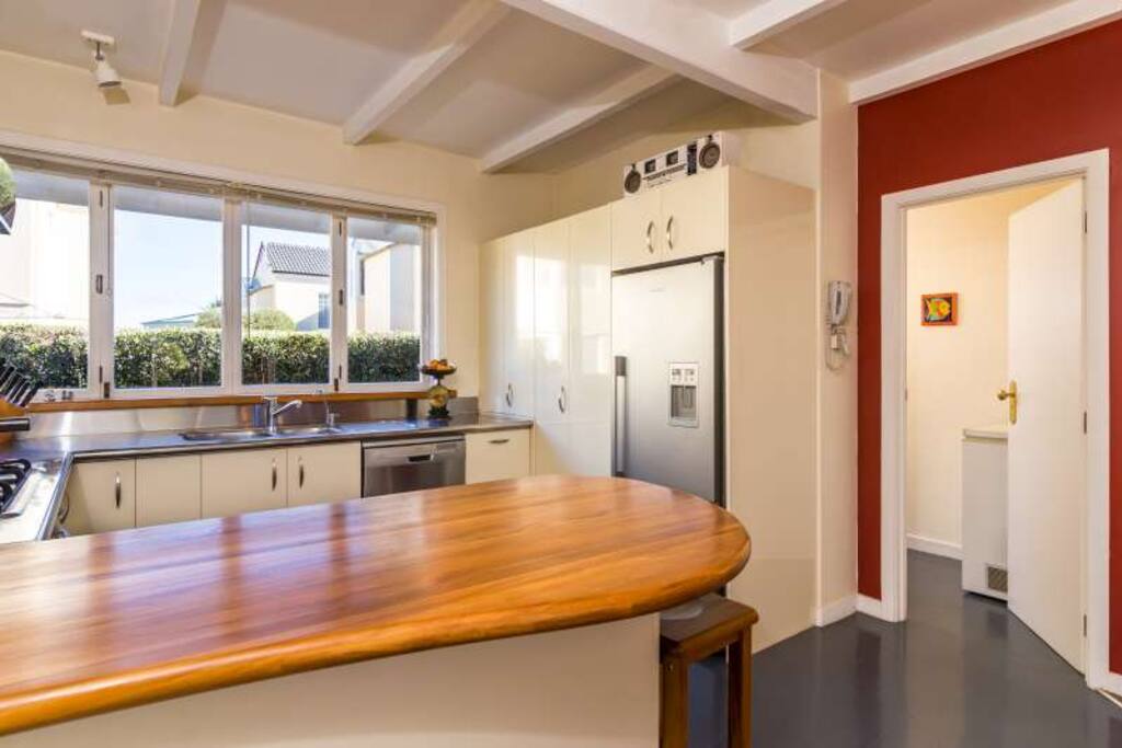 Kitchen with laundry adjacent