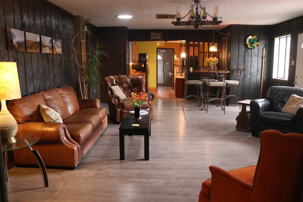 The living room, beyond is the kitchen & dining/game room