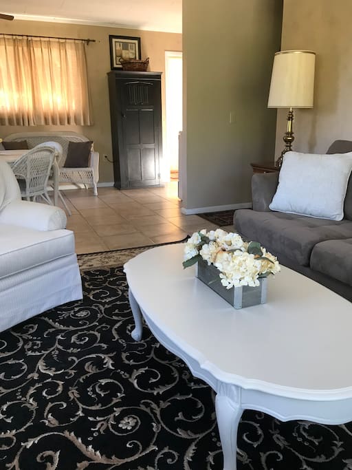View from living room area into kitchen and dining area
