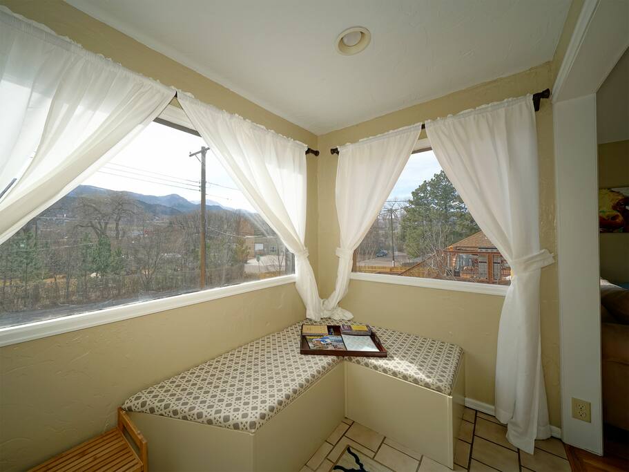 Large windows with views of Pikes Peak.