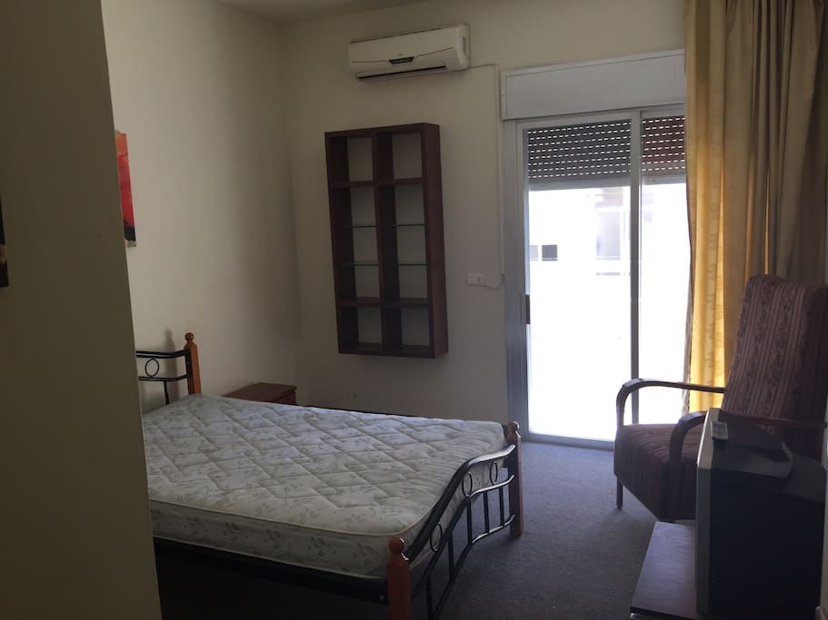 1st room , single bed + closet + balcony