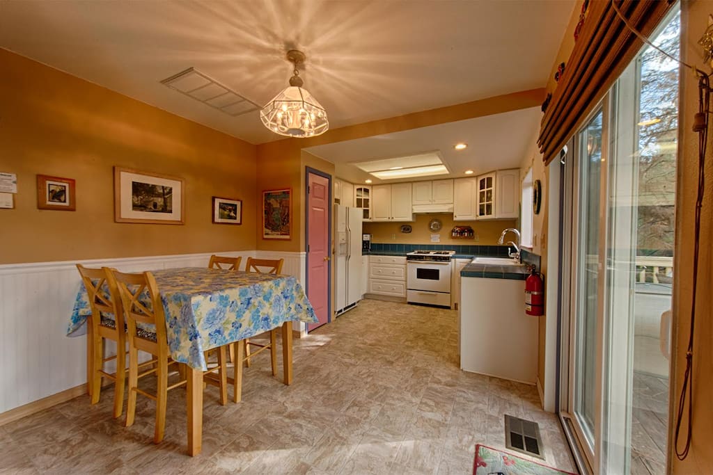 Kitchen includes dishes, pots & pans, utensils spices and cooking oils.