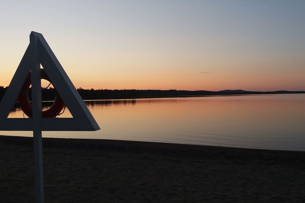 Sunset at nearby beach Sevettijärvi on july.