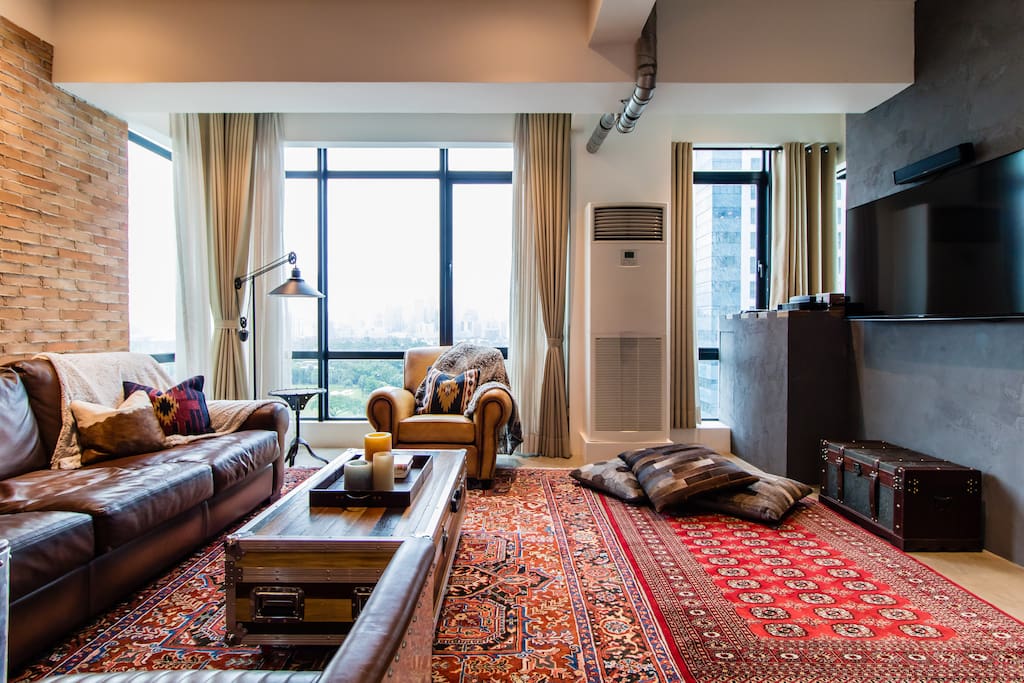 Lounge anywhere in the living room on top of authentic Persian rugs.