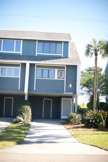 Front of home with a carport.