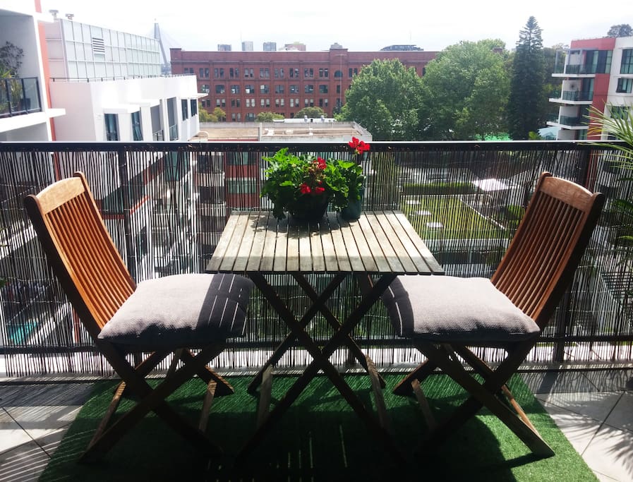 Sunny balcony with an Anzac Bridge glimpse