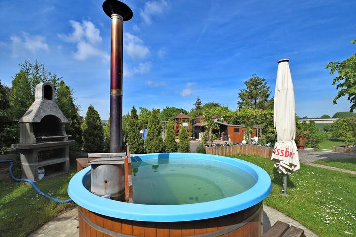 Small holiday home in the Harz with terrace and use of the wellness area