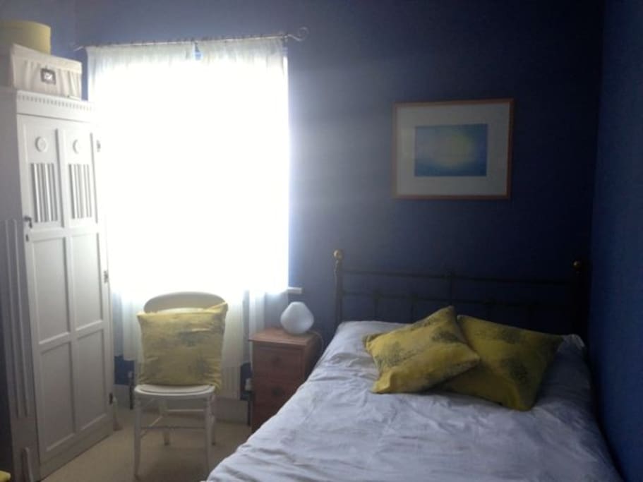 Small-double bed. Wardrobe.