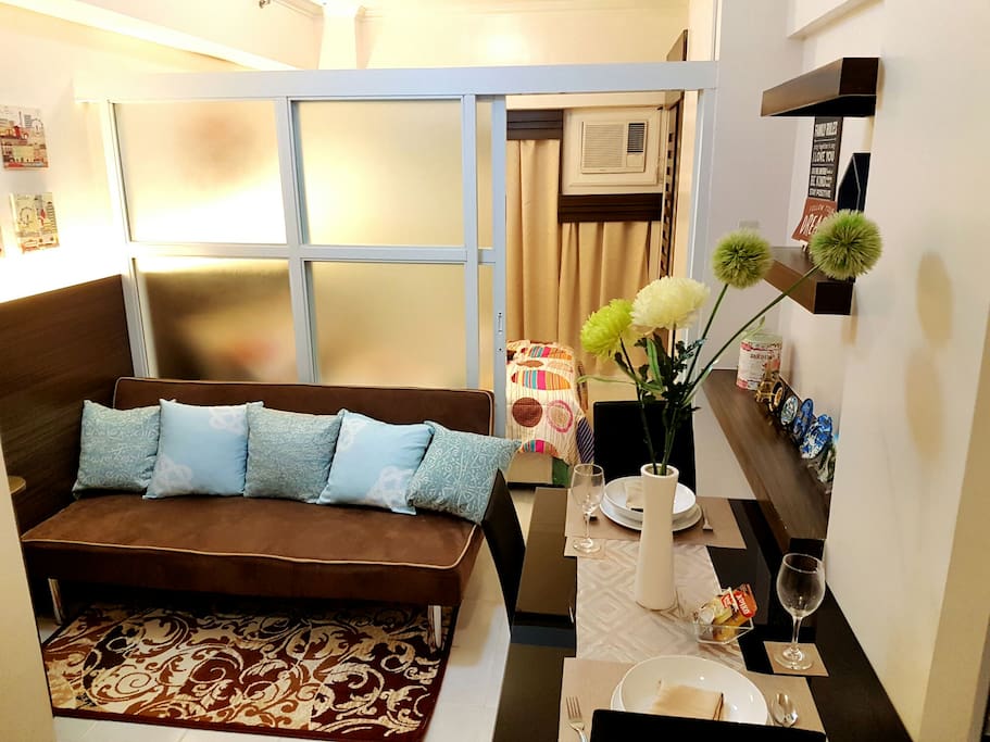 The living room has a sofa bed which can accommodate up to 2pax.