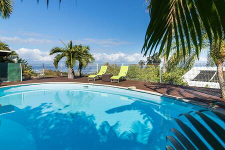 T1  avec piscine privée, vue lagon, clim, wifi