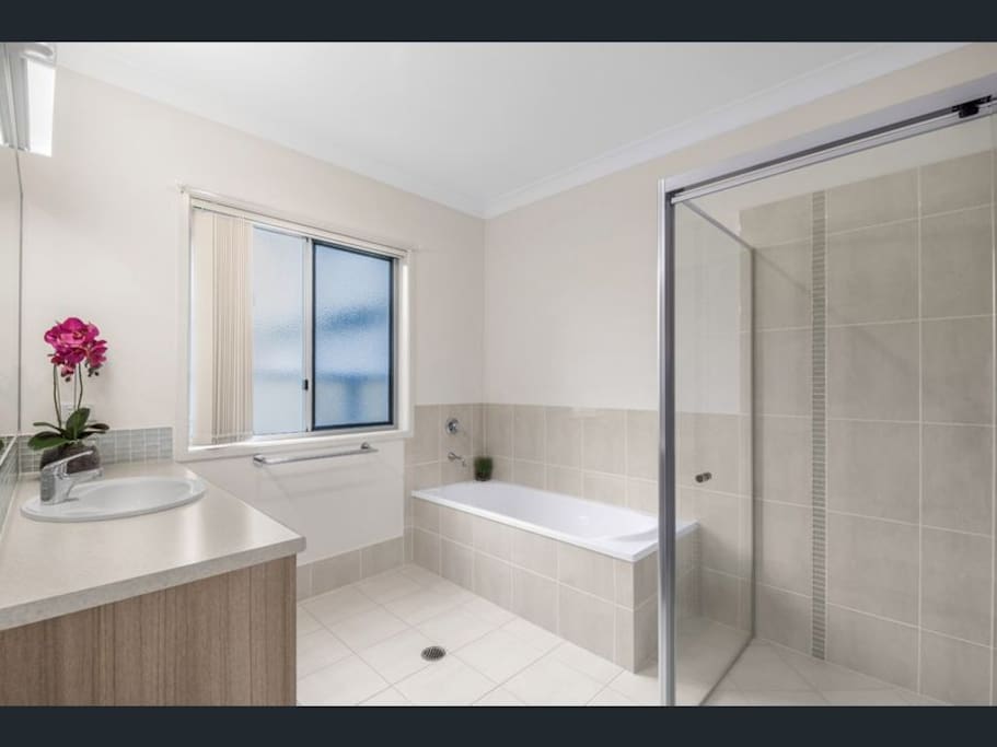 Full bathroom, toilet in separate room.