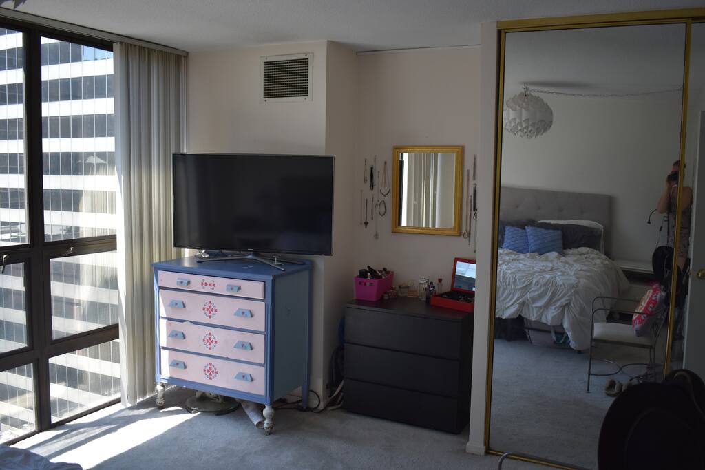 Master bedroom: smart TV (Netflix, Hulu, Amazon, HBO), floor to ceiling closets, black dresser,