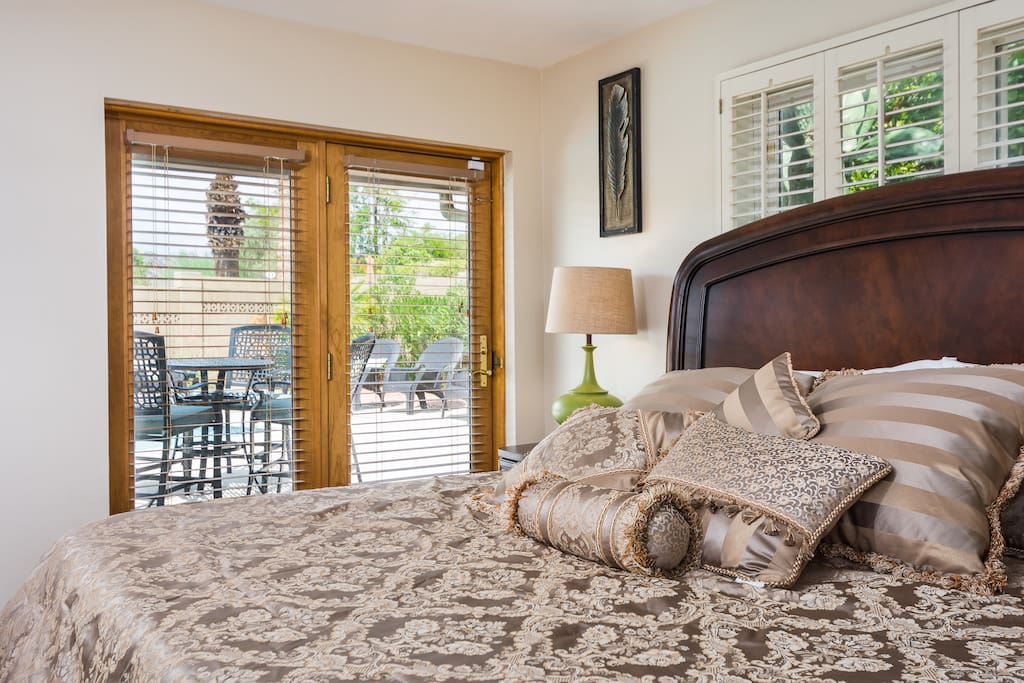 Luxury master suite with TV and king size bed to relax