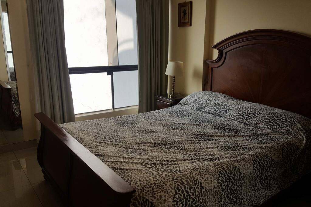 The room has a king bed and 2
nightstands