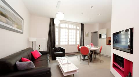 A 2 pas,  la place du marché et la plage - Parking