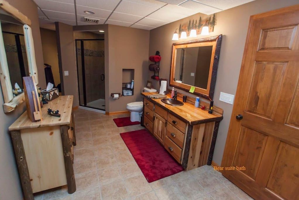 "Bear" bathroom with shower, closet, and dresser