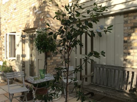 Converted stable & pretty courtyard