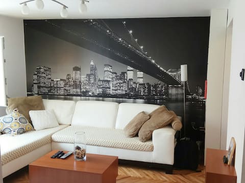 Spacious apartment in townhouse with own parking