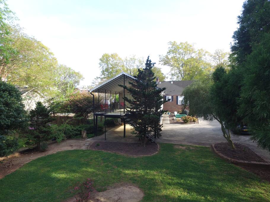 Rear of apartment w/ large deck