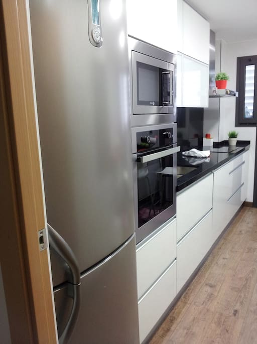 KITCHEN - Induction Cooker
Dishwasher
Nespresso Coffe machine
Fully equipped, with washing machine, microwave, fridge, oven, orange juicer, kettle, toaster, smoothie blender, etc.