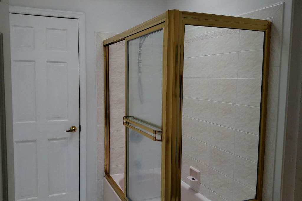 Joint bathroom, shower and tub.