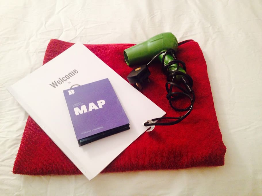 Towel and hairdryer provided.