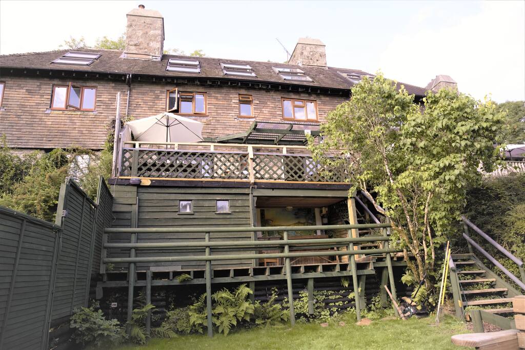 View from the garden of the multi level house and veranda complex.