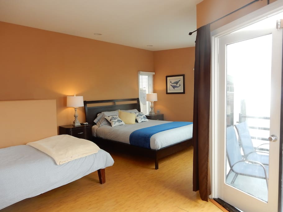 Master suite w/ cal king, 2 twin beds, small and large balcony and full bathroom