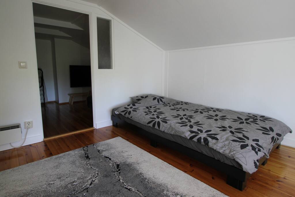 The loft room bed is 120cm wide and quite low, Japanese-style.