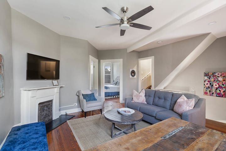 Beautiful living area with a large dining table.  This floor features a queen tempur-pedic bedroom and a bedroom with two temper-pedic twin xl.  Kitchen with stainless steel appliances and a gas range along with a full bath finish out this floor.