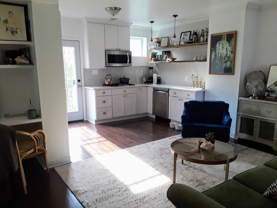 Living room, kitchen combo in the morning.