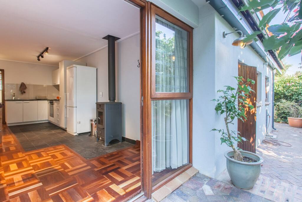 The front door leads out to the garden