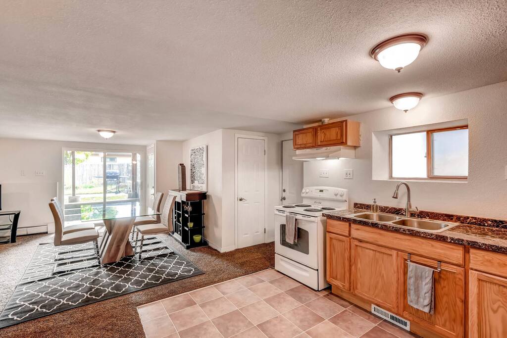 Kitchen freshly remodeled, coat closet/storage. Primary exterior entrance is to the left of the stove.