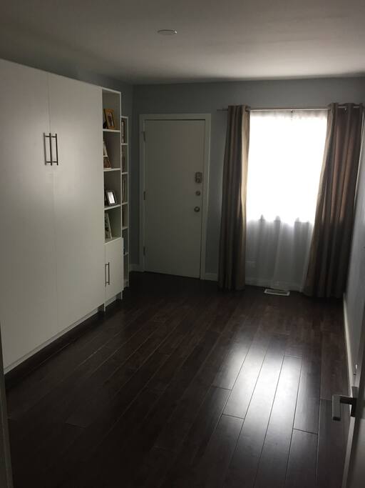 Main entrance and second bedroom once the Murphy bed is pulled out.