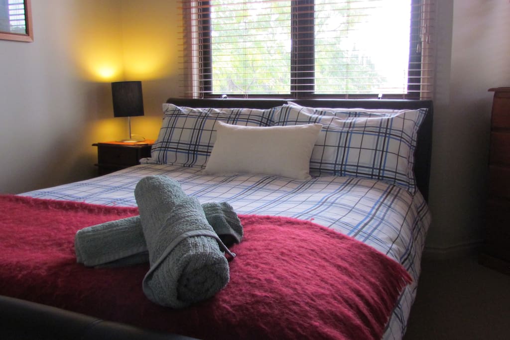 Comfortable queen sized bed 1