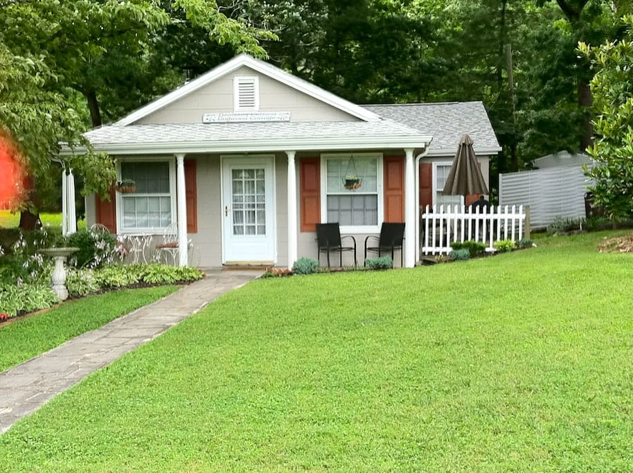 Separate two bedroom, 1100 square ft. cottage adjoining the woods with firepit and bar b que.