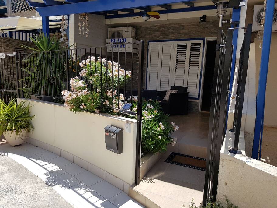 The veranda is always cool no matter how bright the sun... this lovely little house is only 800 metres from the nearest beach...