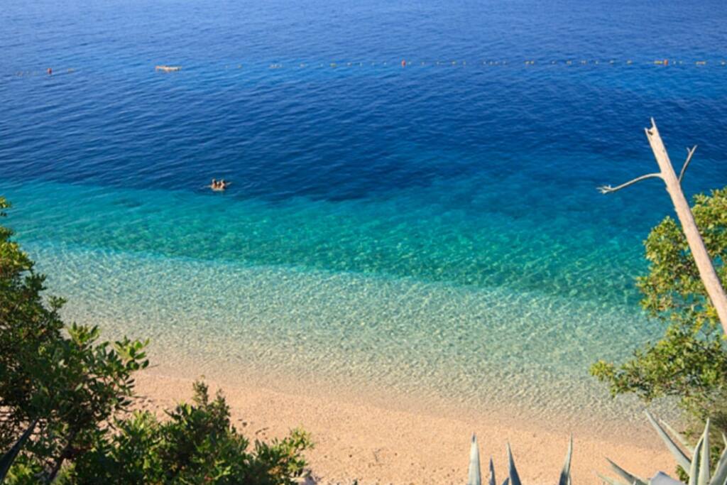...of white pebbles and glittering sand...