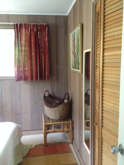 Closet to hang your clothes and Basket with Towels, extra Coverlet.