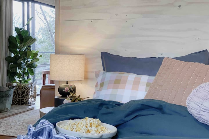 Pop some corn and watch a movie from bed. Both bedrooms have a smart TV so you can stream a good story. 