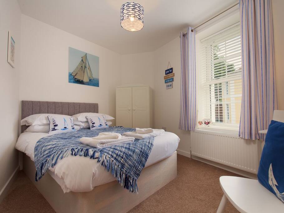 First floor coastal themed bedroom