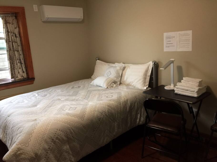 queen bed & working station