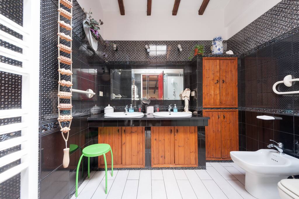 Shared bathroom with two washbasins