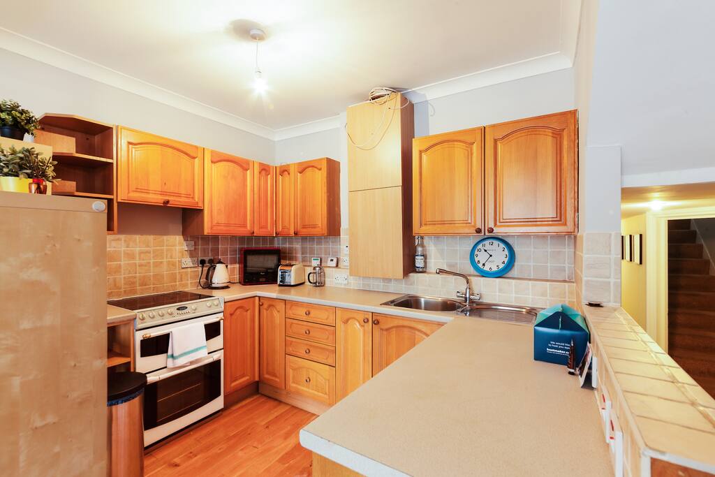 A kitchen with plenty of amenities...