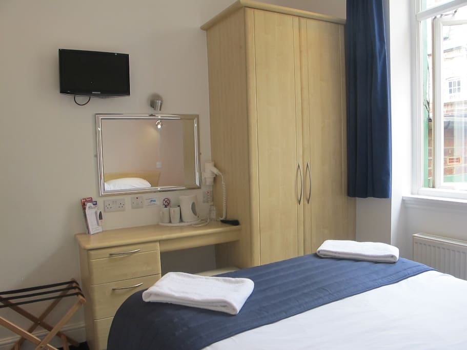 Complimentary Tea & Coffee Making facilities, Safe and Hairdryer.