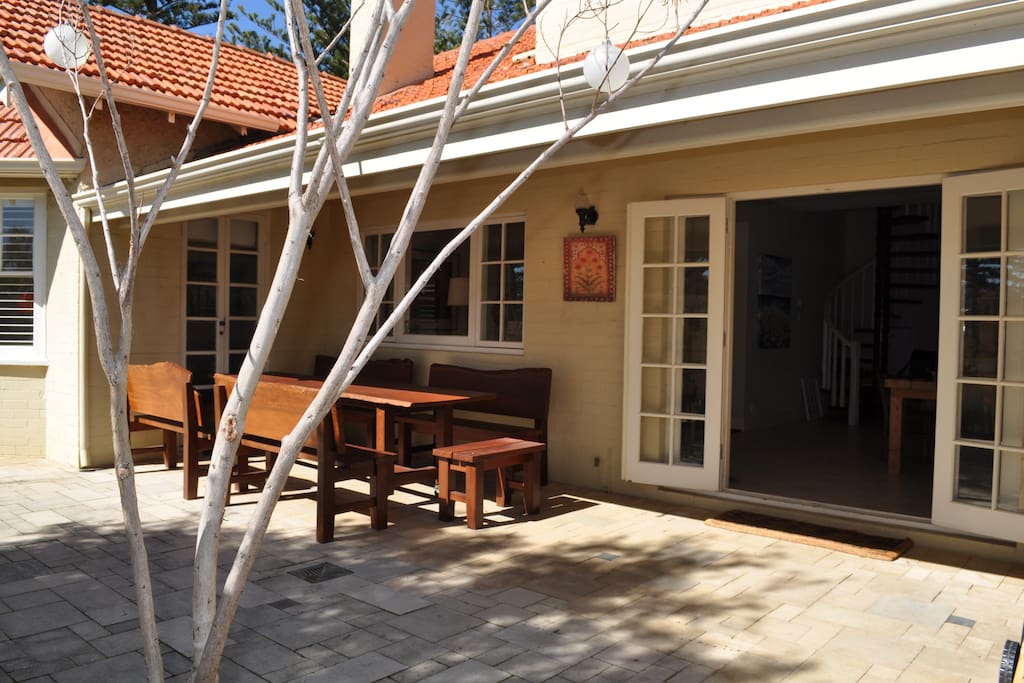 Outdoor area seats 10 guests. A sunny entertaining area. Barbecue set up out here