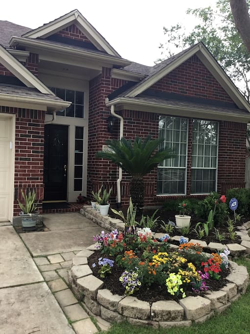 Front door with flower garden fully maintained.