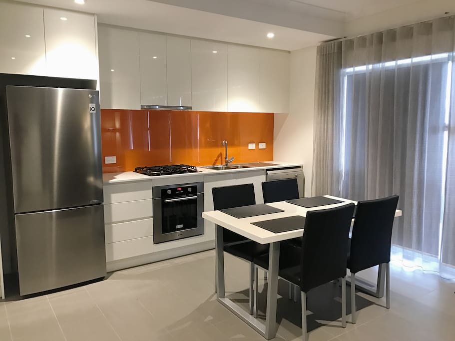 Well equip kitchen with lots of cooking utensils and appliances.